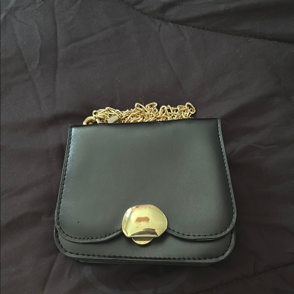Elegant Black Leather Bag with Gold Chain